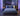 #A modern o2 bed with a sleek, minimalist design, featuring a soft neutral headboard and deep blue bedding, set in a contemporary bedroom with ambient lighting. Perfect for luxury and stylish home decor.